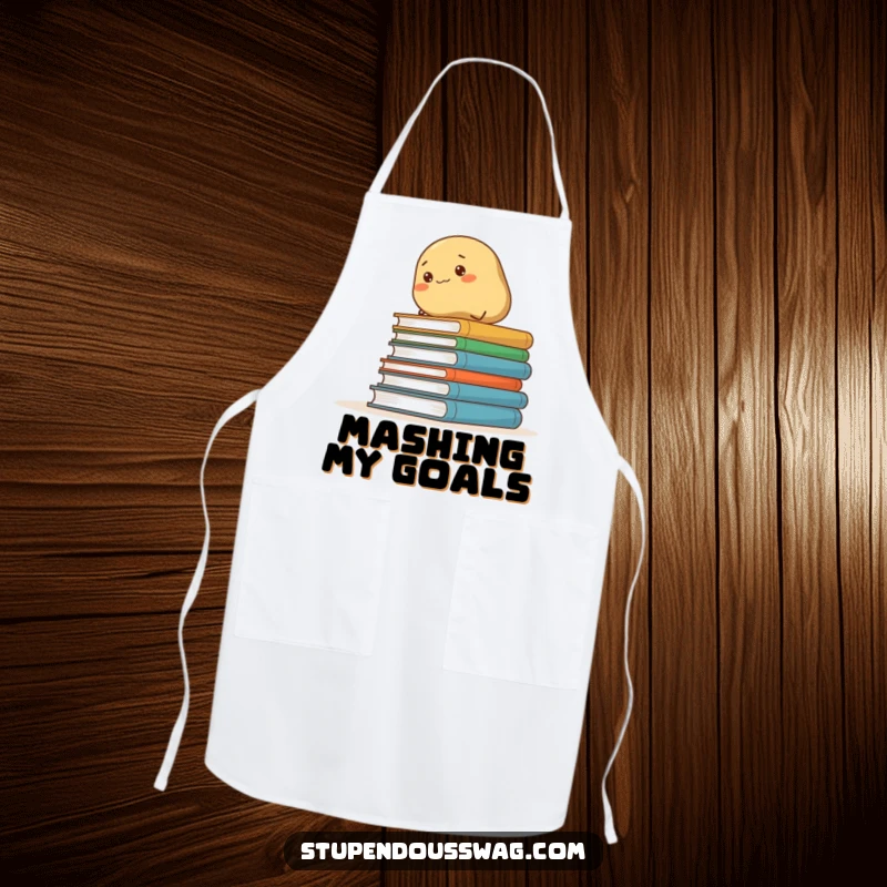 Funny apron featuring a tenacious potato scaling a stack of books, adding a humorous touch to kitchen duties.