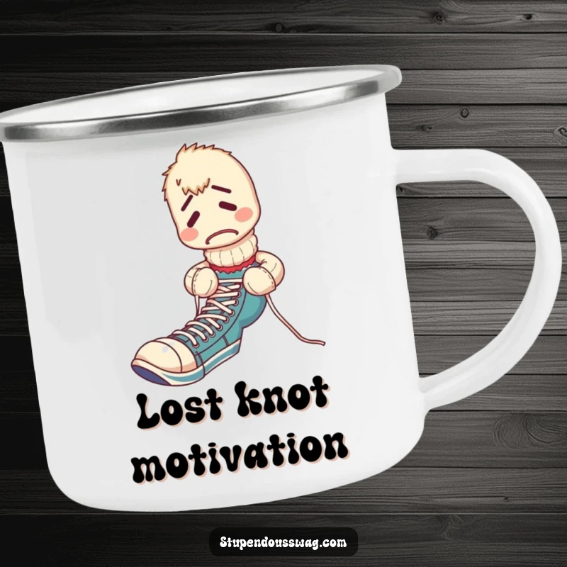 Funny camping mug showing a confused sock puppet tangled in shoelaces, ready for campfire stories and shared amusement.