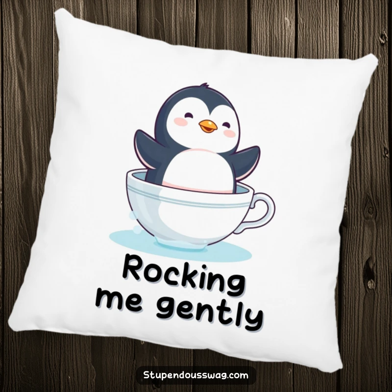 Funny penguin teacup pillow with a dizzy bird sailing in a coffee cup, a soft and humorous decorative gift.