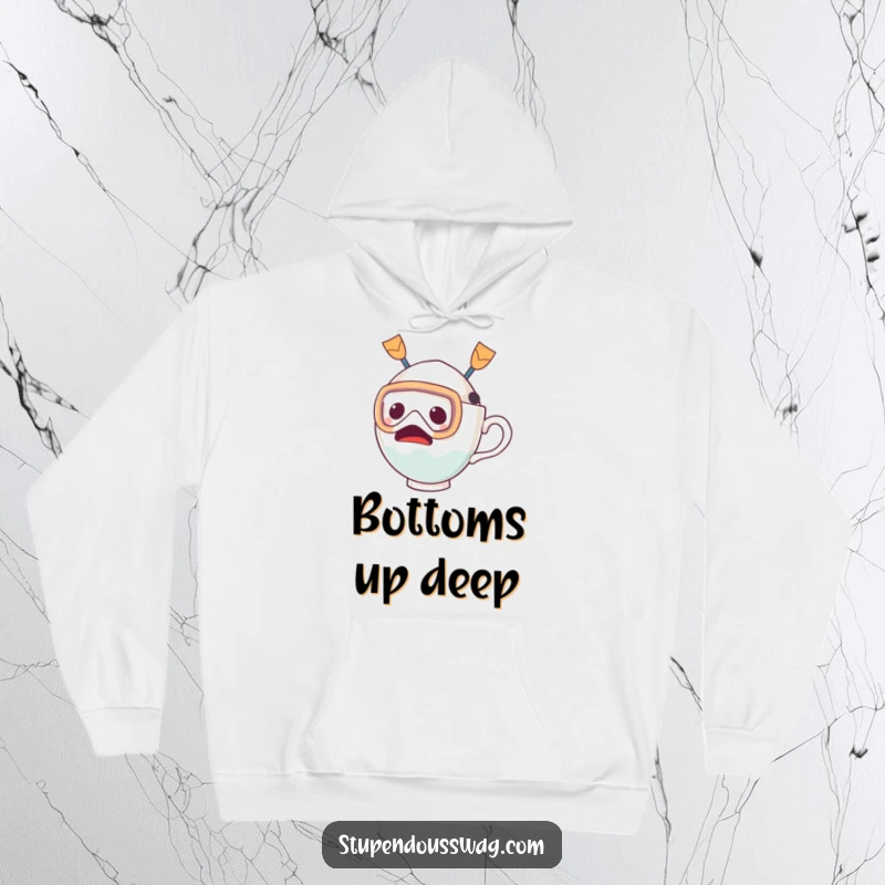 Funny hoodie featuring a startled teacup character sporting a diving mask and fins, ready for an unexpected dive, offering warmth and humor.