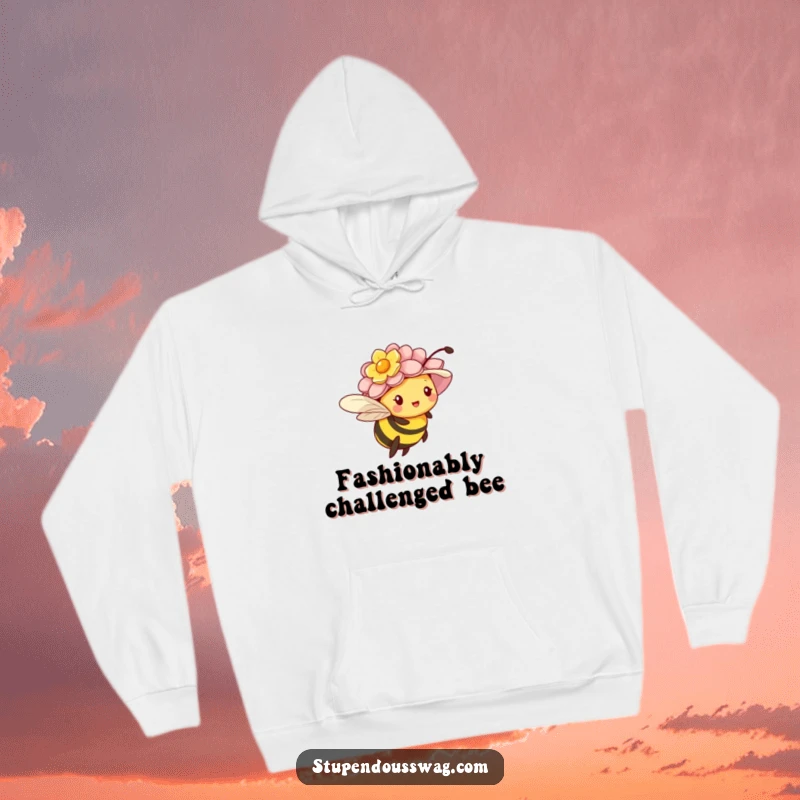Funny hoodie depicting a tiny bee comically attempting flight with an oversized flower hat hindering it.