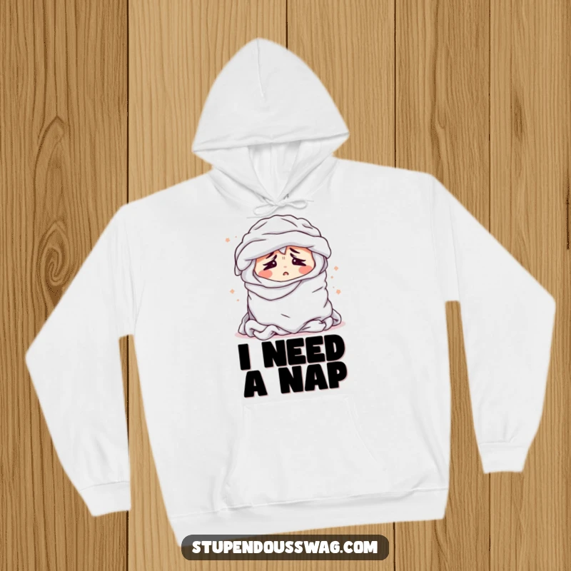 Funny hoodie displaying a bewildered pile of laundry sighing dramatically, a comically relatable image for laundry enthusiasts.