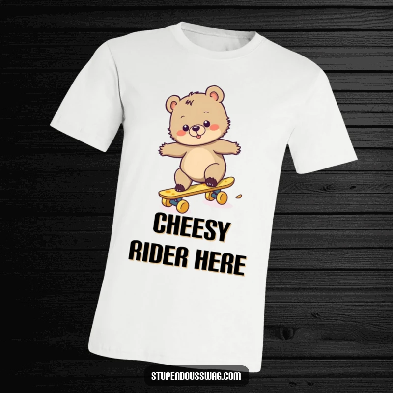Funny t-shirt featuring a clumsy bear cub attempting to balance on a skateboard crafted from cheese, a comedic spectacle.