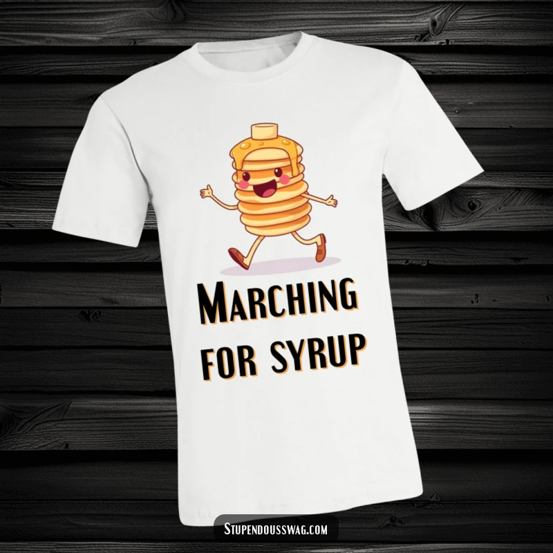 Funny T-shirt depicting a cheerful yet wobbly stack of pancakes humorously marching forward, embodying breakfast fun and determination.