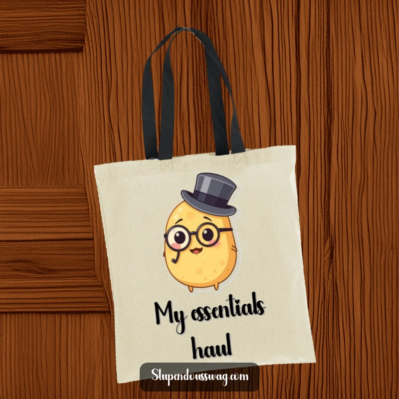 Funny tote bag featuring a potato in a monocle and top hat, ideal for carrying items with a touch of distinguished and humorous vegetable flair.