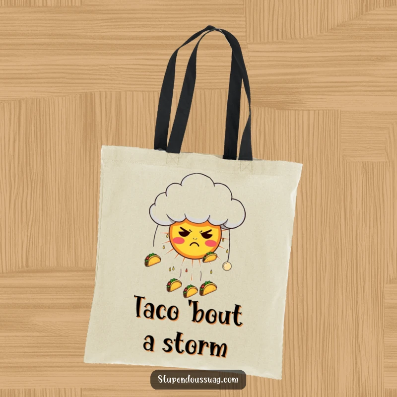 Funny tote bag depicting a grumpy cloud raining tacos onto a confused sun, ideal for a humorous and practical accessory.